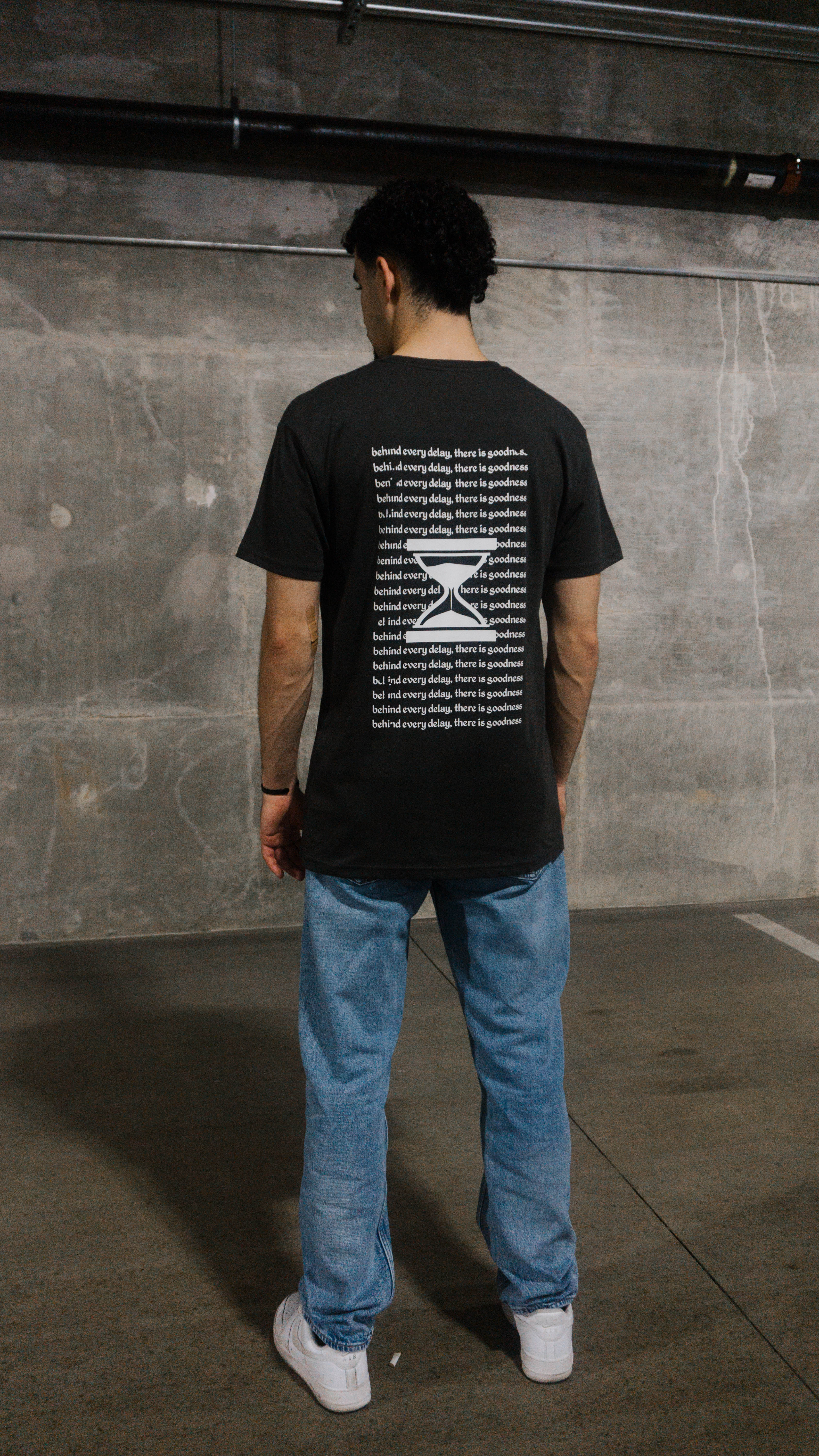 "Behind Every Delay There is Goodness" T-Shirt - Unisex